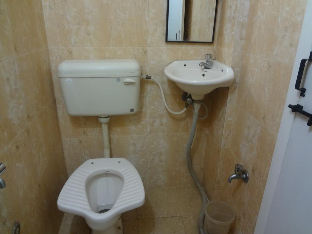 Hotel Rajmandir Púna Szoba fotó
